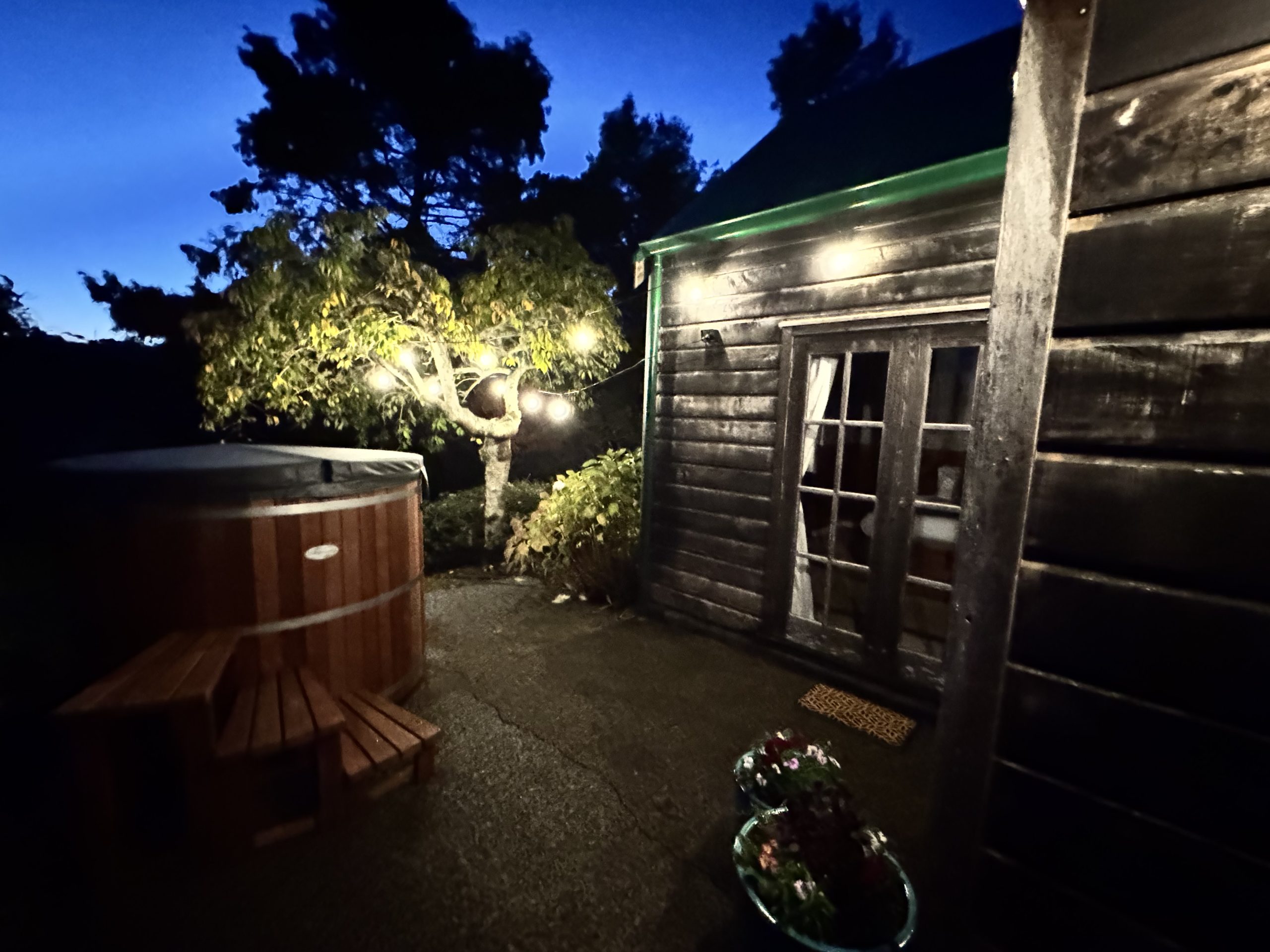 VC Cedar Hot Tubs in the dusk